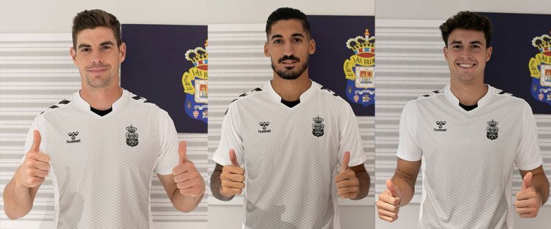 Tres porteros con los pulgares en alto